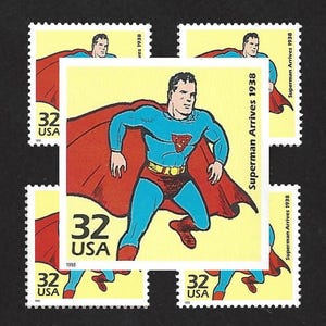 May include: Five US postage stamps featuring Superman in his iconic red cape and blue suit. The stamps are yellow with the text "Superman Arrives 1938" and "32 USA".