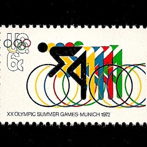 May include: A US 6 cent postage stamp commemorating the XX Olympic Summer Games Munich 1972. The stamp features a stylized black silhouette of a cyclist riding a bicycle with colorful rings representing the Olympic rings.