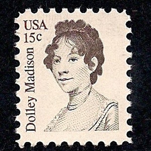 May include: A vintage 15-cent United States postage stamp featuring a portrait of Dolley Madison, the First Lady of the United States from 1809 to 1817.