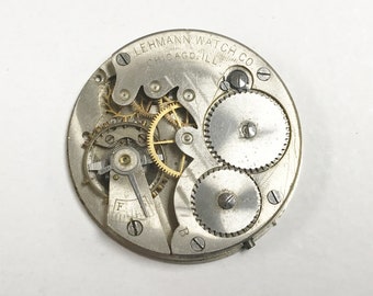 e887 Antique Lehmann Pocket Watch Movement for Parts or Repair 43mm