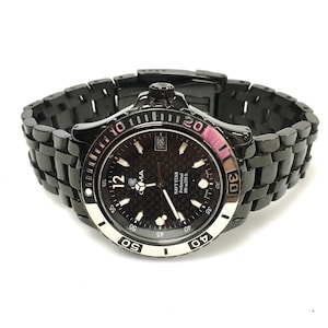 V311 Vintage CYMA NAVYSTAR 100m WR Quartz Swiss Made  display picture 3