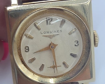 k697 Vintage 1960s Unisex 14kt Yellow Gold Longines Mechanical Wristwatch
