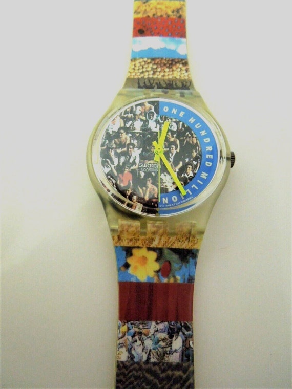 s497 Swiss Made One Hundred Million People Swatch 