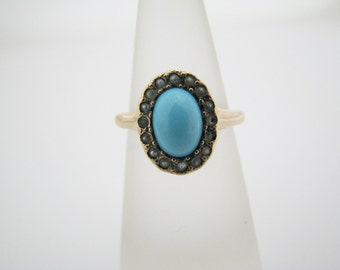 a1089 Vintage Ring w/ Oval Turquoise Stone surrounded by Seed Pearls in 10k YG