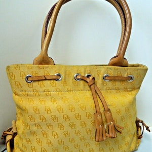Dooney and shop bourke yellow wallet