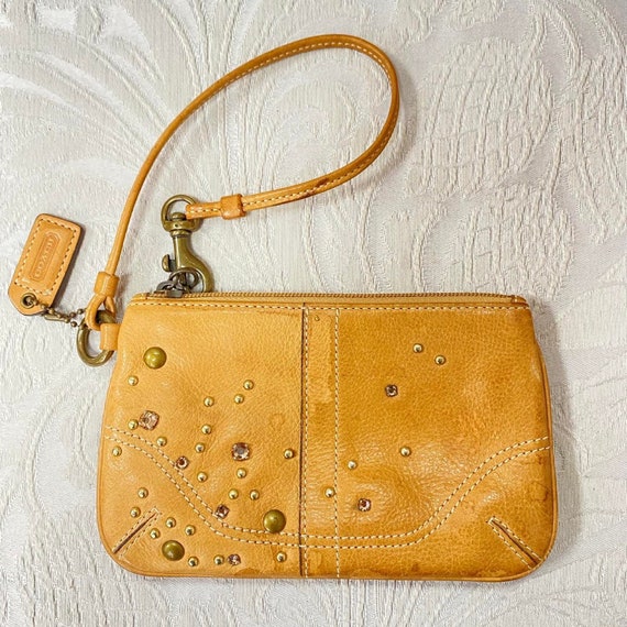 Light yellow coach clearance purse