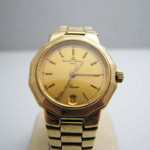 b310 Women's 18kt Yellow Gold Baume & Mercier Riviera wristwatch with box and papers