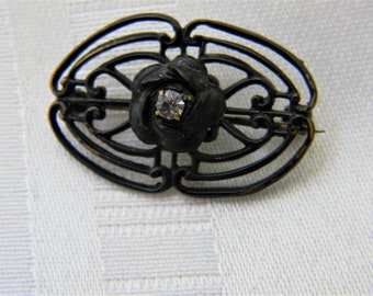 j388 Unique Vintage Black Brooch with Clear Center Stone