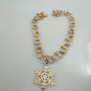 g737 Pretty Ladies 14kt Yellow Gold Rolo Link Bracelet with Attached Snowflake Charm
