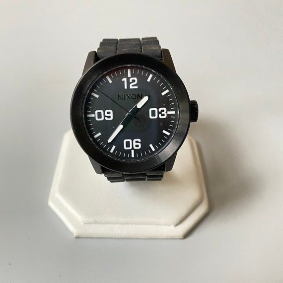 nixon minimal the time teller 100m stainless steel japan movement