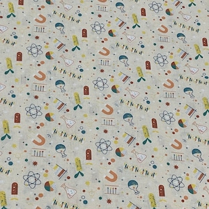 May include: Off-white fabric with a repeating pattern of science-themed illustrations. The design includes atoms, beakers, magnets, DNA strands, and other scientific elements in shades of brown, yellow, green, and blue.
