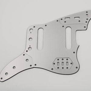 metaliczny srebrny akrylowy pickguard i płytki kontrolne do gitary Fender Standard Jaguar w wersji amerykańskiej/meksykańskiej