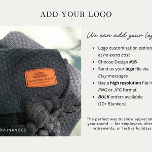 a close-up of a gray throw blanket with an engraved leather patch on it, along with text providing information about the ability to add a logo to the blanket.