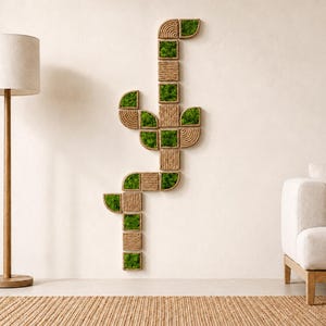 May include: A vertical wall art installation composed of modular square and semi-circular tiles. Each tile features either a textured natural jute rope coil pattern or a vibrant green preserved moss insert, arranged in a branching cactus-like shape.