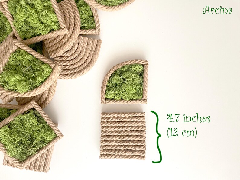 May include: A collection of quarter-circle wall decor pieces featuring bright green preserved moss framed by natural tan twisted rope. Each piece measures 4.7 inches in height. The brand name Arcina is printed in green text in the corner.