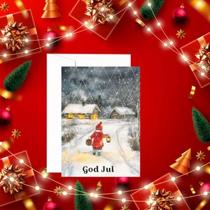 May include: A Christmas card with a snowy winter scene. A child in a red coat walks through the snow with a lantern. The card says "God Jul" which is Swedish for "Merry Christmas".