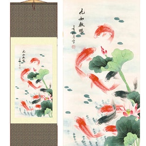 May include: A traditional Chinese scroll painting depicting nine red and black koi fish swimming among lotus leaves and flowers. The scroll is mounted on a wooden dowel and has a hanging cord.