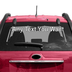 May include: A red SUV with a black rear window and a white vinyl decal that says "Any Text You Want".