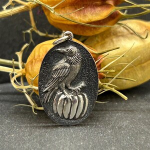 Sterling Silver Raven and Pumpkin Charm, Sterling Silver Raven Pendant in Oval Frame, Raven Pendant, Bird Charm, Bird Pendant
