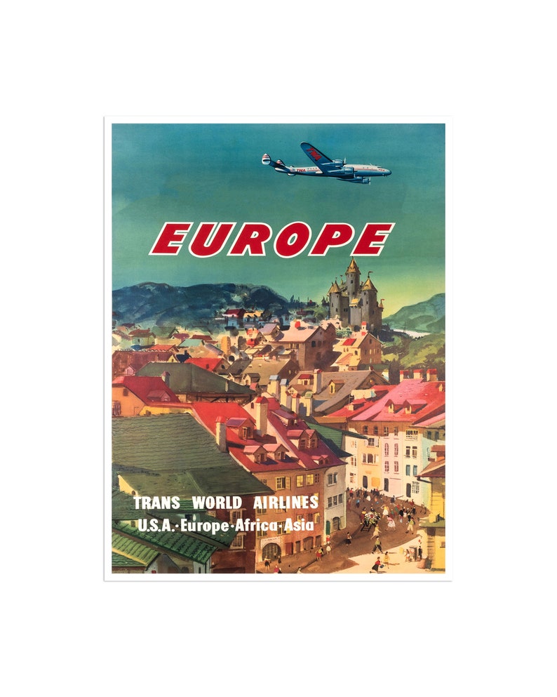 May include: Vintage travel poster advertising Trans World Airlines flights to Europe. The poster features a blue and white airplane flying over a colorful cityscape with red rooftops and a castle in the background. The text "EUROPE" is in large red letters at the top of the poster. The airline's name and destinations are listed at the bottom: "TRANS WORLD AIRLINES U.S.A. - Europe - Africa - Asia."