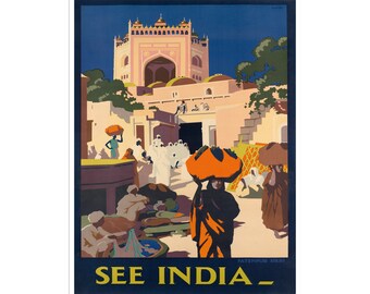 May include: Vintage travel poster with the text "SEE INDIA" in gold lettering. The poster depicts a scene of Fatehpur Sikri, India, with a pink and beige building and people carrying items on their heads.