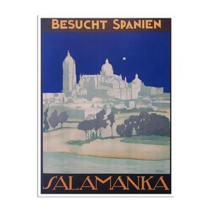 May include: A vintage travel poster advertising a visit to Salamanca, Spain. The poster features a blue sky with a white moon, a white cityscape with a church, and the text "BESUCHT SPANIEN SALAMANKA" in orange and black.