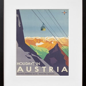 May include: A vintage travel poster advertising holidays in Austria. The poster features a cable car ascending a mountain range with a blue sky and white clouds in the background. The text "HOLIDAYS IN AUSTRIA" is printed in bold, black letters at the bottom of the poster. The text "INQUIRIES ANSWERED BY ALL TRAVELLING AGENCIES" is printed in smaller, black letters below the main text.