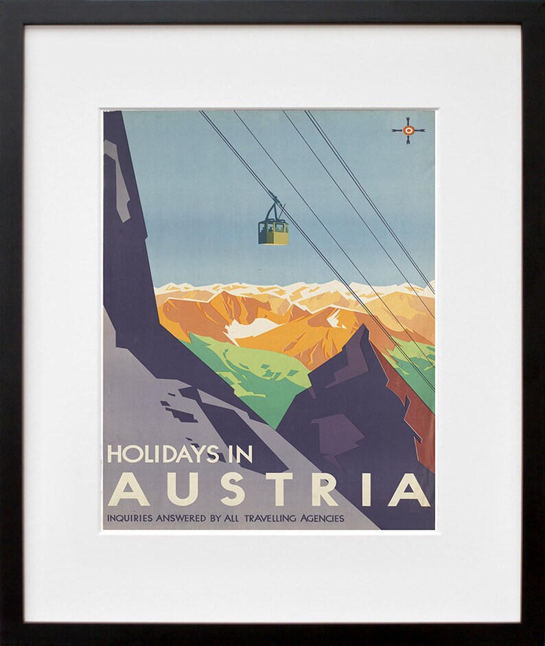 May include: A vintage travel poster advertising holidays in Austria. The poster features a cable car ascending a mountain range with a blue sky and white clouds in the background. The text "HOLIDAYS IN AUSTRIA" is printed in bold, black letters at the bottom of the poster. The text "INQUIRIES ANSWERED BY ALL TRAVELLING AGENCIES" is printed in smaller, black letters below the main text.