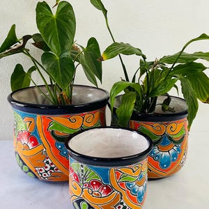 A Set of 3 Talavera pots