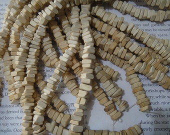 tan color, square heish beads, 7-8mm natural coconut shell bead, 15.5 inch strand.