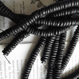 black color, 8mm tumbled coconut heishi beads, 15.5 inch