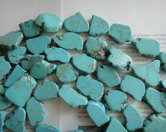 about 25 to 30 mm turquoise freeform slab beads, 15.5 inch. hole drilled