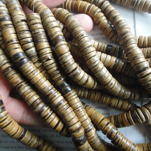 24 inch long natural old waxed 10mm natural coocnut heishi beads