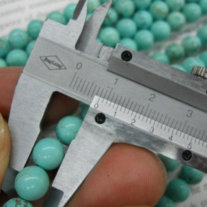 wholesale-3 strands-4mm, 6mm, 8mm, 10mm natural stablized howlite turquoise round beads. image 4