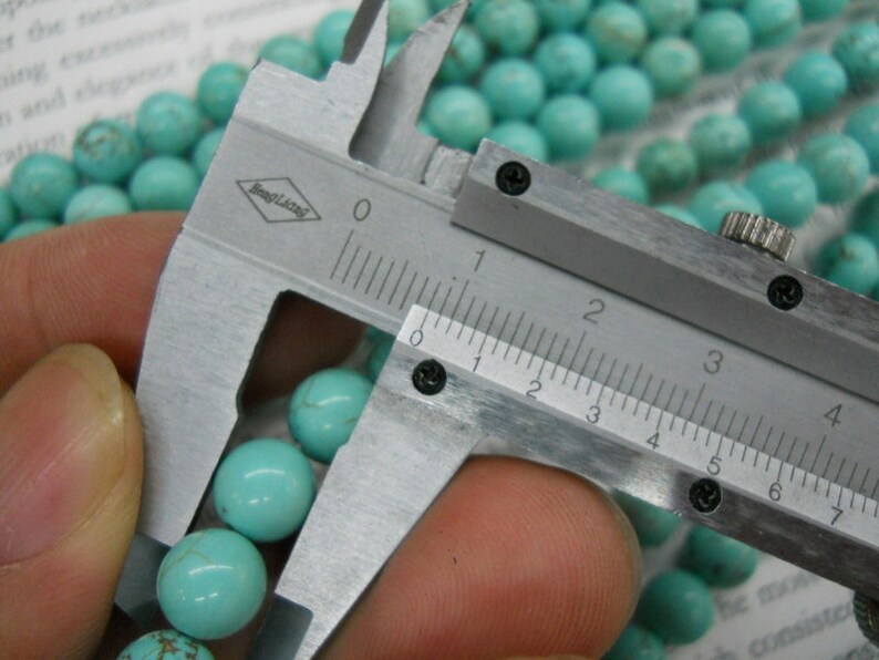 wholesale-3 strands-4mm, 6mm, 8mm, 10mm natural stablized howlite turquoise round beads. image 4