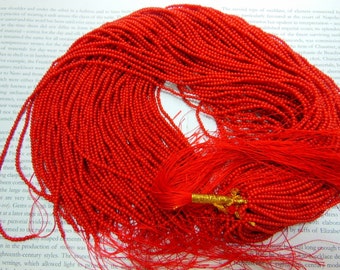 2.5mm red coral beads, round, 15.5" strand long