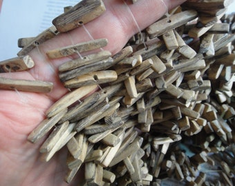 Stick beads, 110 beads, center dirlled coconut shell chip beads, about 22-27mm.