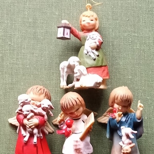 Lot of four vintage plastic angel and animal Christmas ornaments Hong Kong