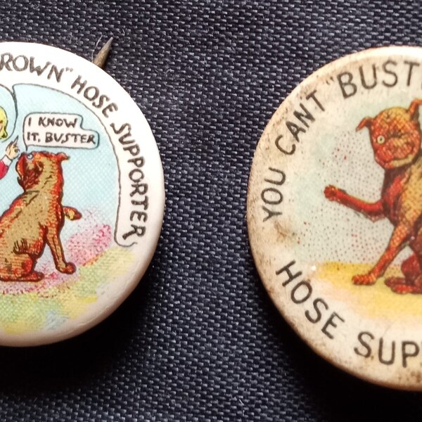 Two vintage Buster Brown Tige hose supporter advertising pin back button pin