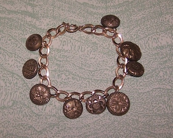 Vintage antique gold antique buttons charm bracelet intricate designs