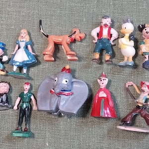 Destash lot of 11 vintage Disneykins figurines Daisy Duck Dumbo Gepetto Figaro Peter Pan Minnie Mouse