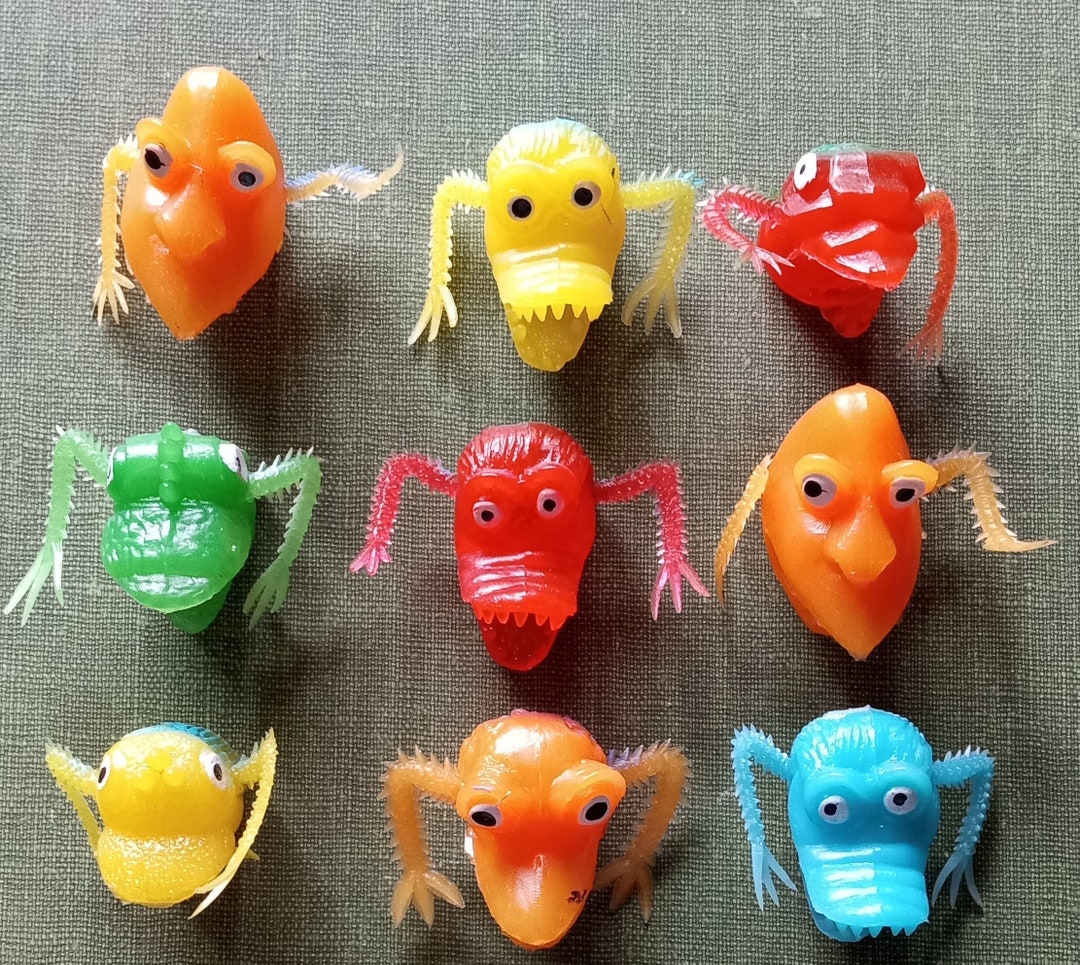 Lot of Nine Vintage Jiggly Finger Monster Head Toppers Finger Puppets