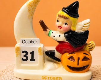 Calendario perpetuo con figura de bruja de Halloween de estilo vintage: Atlas de los años 50 inspirado en Japón