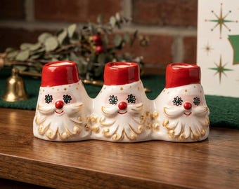 Portavelas triple con diseño de Papá Noel y ojos estrellados, inspirado en Holt Howard, decoración navideña de mediados de siglo (MCM).