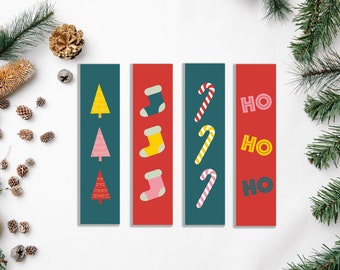 Könnte beinhalten: Vier Lesezeichen zum Thema Weihnachten. Das erste Lesezeichen ist türkis mit gelben, rosa und roten Weihnachtsbäumen. Das zweite ist rot mit grünen, gelben und rosa Socken. Das dritte ist türkis mit Zuckerstangen. Das vierte ist rot mit dem Text "HO HO HO".