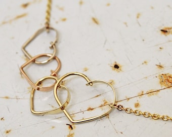 14k gold interlocking hearts necklace