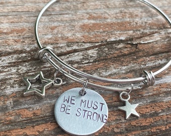 We Must Be Strong - Bangle Inspired by She-Ra - Hand-Stamped