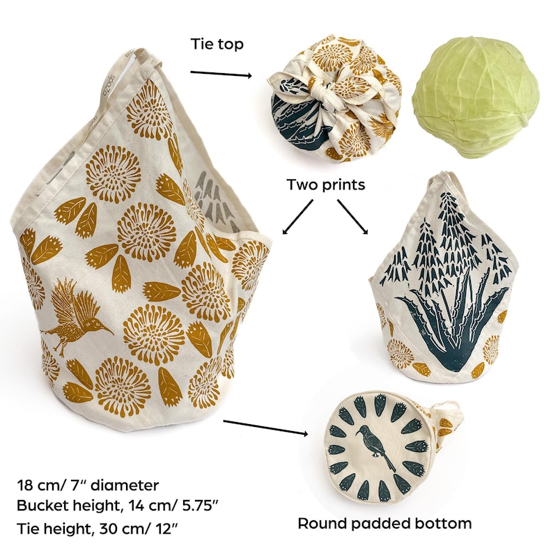 May include: A reusable fabric shopping bag with a round padded bottom and a tie top. The bag is made of natural fabric with a floral print in yellow and white. The bag is 7 inches in diameter and 5.75 inches tall. The tie is 12 inches long.