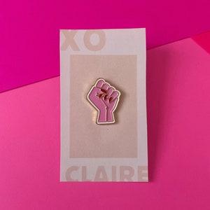 Pink Feminist Raised Fist Red Claw Nails Enamel Pin image 1