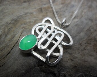 A chrysoprase ornate sterling silver pendant